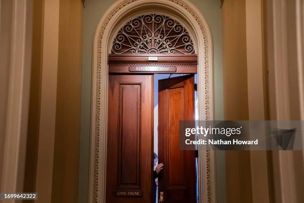 Sen. John Thune speaks to members of the media outside the Senate Chamber following passage in the House of a 45 day continuing resolution on...