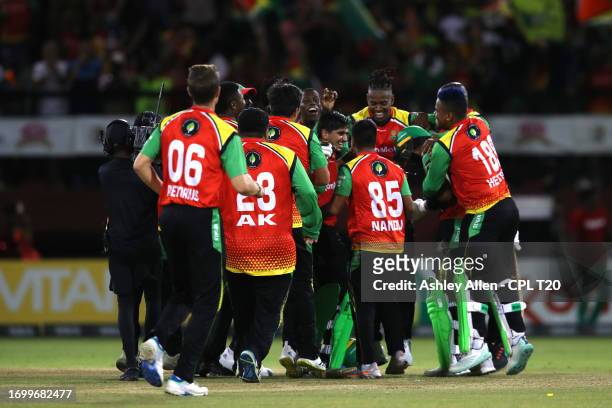 Guyana Amazon Warriors players celebrate victory during the Republic Bank Caribbean Premier League Final between Trinbago Knight Riders and Guyana...