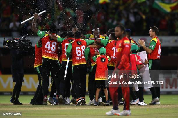Guyana Amazon Warriors players celebrate victory during the Republic Bank Caribbean Premier League Final between Trinbago Knight Riders and Guyana...