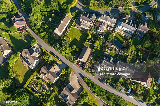 aerial view over picturesque country homes green summer gardens - aerial views of british columbias capital ahead of gdp figures stockfoto's en -beelden