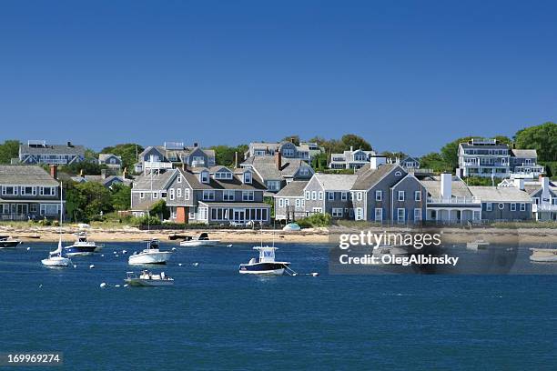 boats and waterfront houses, nantucket, massachusetts. clear blue sky. - ma bildbanksfoton och bilder