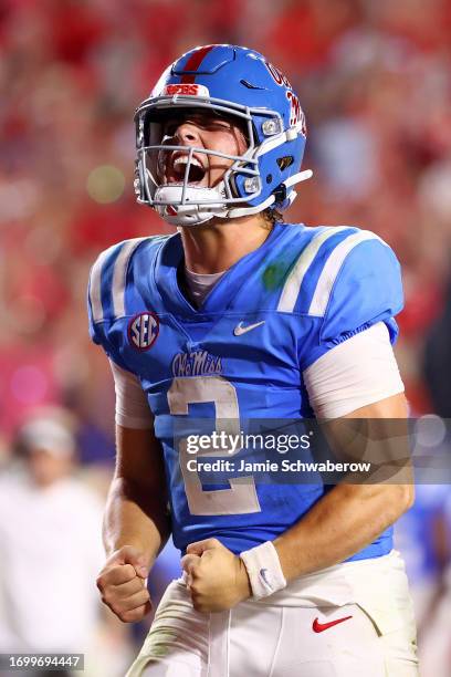 Jaxson Dart of the Mississippi Rebels celebrates a game-winning touchdown against the LSU Tigers at Vaught-Hemingway Stadium on September 30, 2023 in...