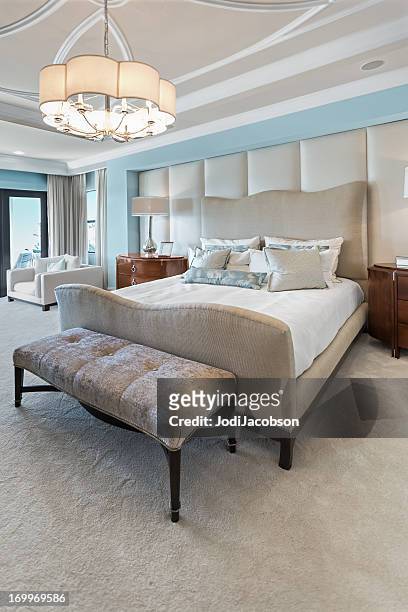beautiful master bedroom interior - upholstry stockfoto's en -beelden