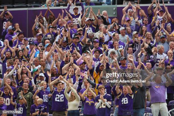 Minnesota Vikings fans do the Skol clap during the game against the Los Angeles Chargers at U.S. Bank Stadium on September 24, 2023 in Minneapolis,...