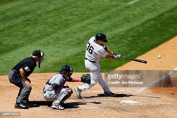 Kevin Youkilis of the New York Yankees connects on a sixth inning double against the Cleveland Indians at Yankee Stadium on June 5, 2013 in the Bronx...