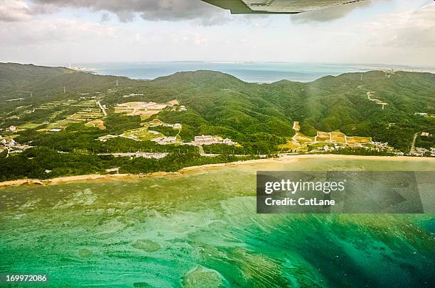 okinawa, japan: aerial view - ariel view beach stockfoto's en -beelden