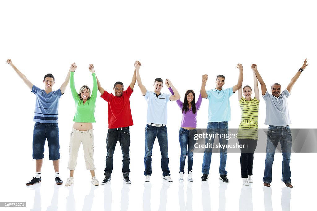 Large group of people standing and looking at the camera.