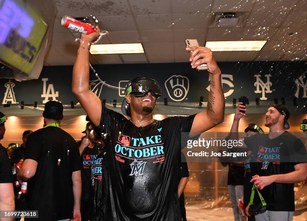 Members Miami Marlins celebrate after a 7-3 win over the Pittsburgh Pirates to clinch a National League Wildcard berth at PNC Park on September 30,...