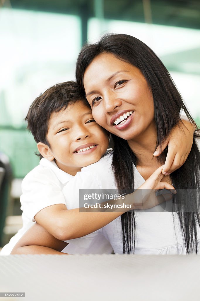 Portrait of an Asian mother and son.