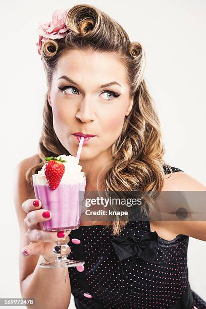 beautiful rockabilly woman with milkshake - rockabilly pin up girls stock pictures, royalty-free photos & images