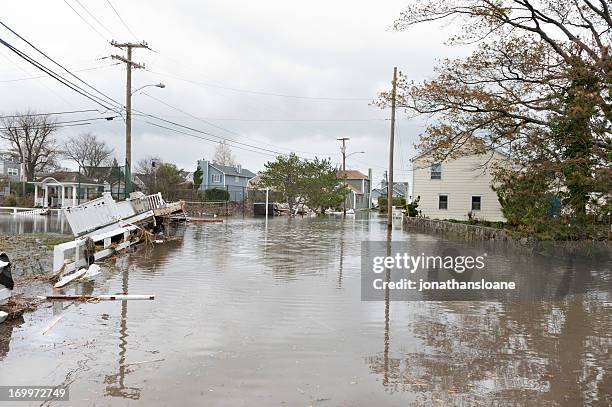 damaged houses and flooded streets after hurricane sandy - hurricane sandy bildbanksfoton och bilder