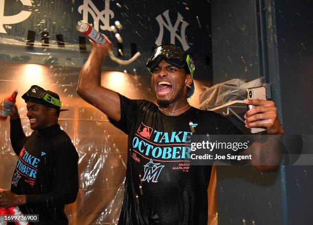 Members of the Miami Marlins celebrate after a 7-3 win over the Pittsburgh Pirates to clinch a National League Wildcard berth at PNC Park on...