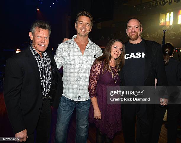 Randy Travis, John Schneider, Carlene Carter and John Carter Cash attend the Johnny Cash Limited-Edition Forever Stamp launch at Ryman Auditorium on...