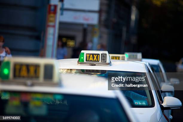 taxi cabs in madrid, spain - taxi stock pictures, royalty-free photos & images