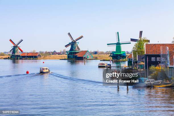 windmills, zaanse schans, netherlands - zaanse schans stock-fotos und bilder