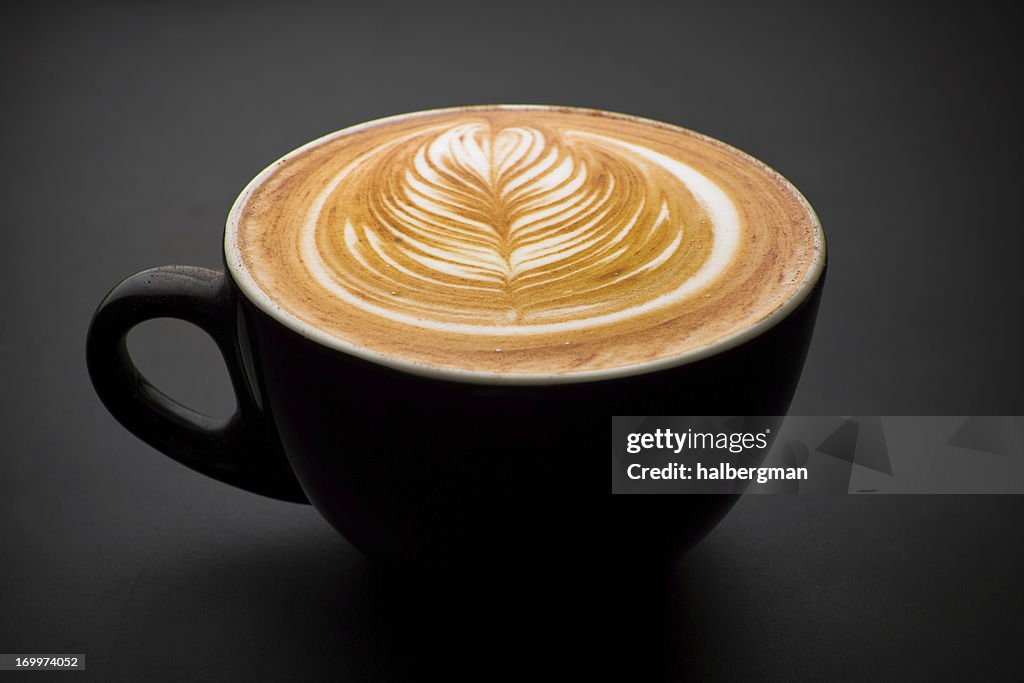 Latte with intricate foam art