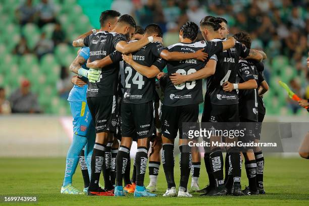 Players of Necaxa gather during the 9th round match between Santos Laguna and Necaxa as part of the Torneo Apertura 2023 Liga MX at Corona Stadium on...