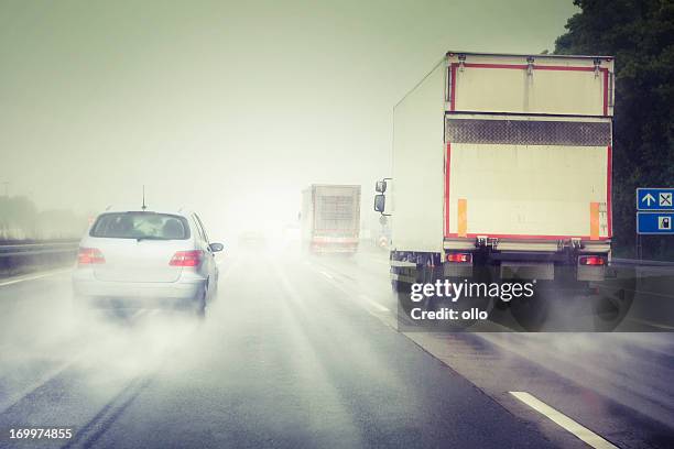 bad weather on the highway - car rain stock pictures, royalty-free photos & images