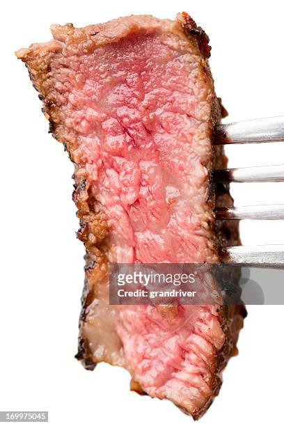 steak bite - rare stock pictures, royalty-free photos & images