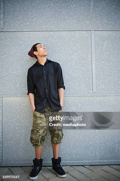 portrait of young mixed race teenage boy - 19 years stock pictures, royalty-free photos & images