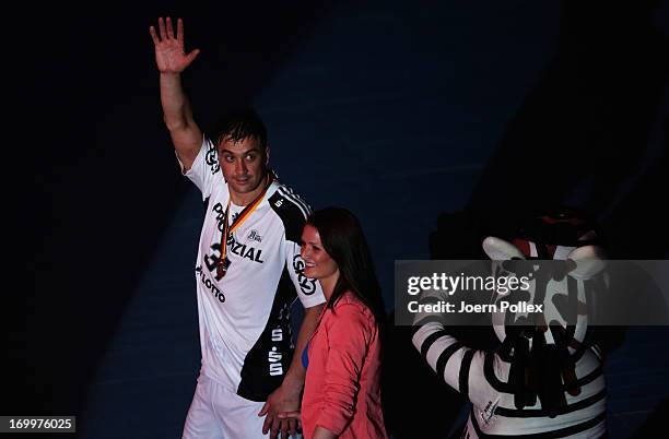 Momir Ilic says goodbye to the fans as the players of THW Kiel present the Bundesliga trophy to the fans at the Sparkasse Arena on June 5, 2013 in...