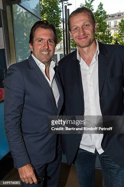 Christophe Lambert, managing director of Europacorp and producer Nicolas Altmayer attend the premiere of the film 'Les Petits Princes' at Drugstore...