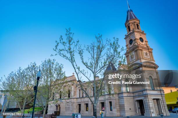 city streets and buildings at sunset - fremantle stock pictures, royalty-free photos & images