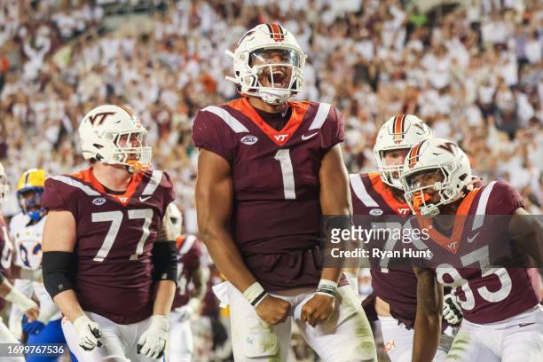Kyron Drones of the Virginia Tech Hokies celebrates after a touchdown against the Pittsburgh Panthers in the second half during a game at Lane...