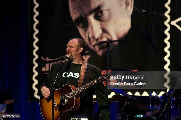 John Carter Cash plays the Johnny Cash Limited-Edition Forever Stamp launch at Ryman Auditorium on June 5, 2013 in Nashville, Tennessee.