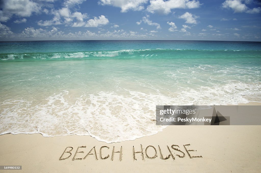 Beach House Message on Bright Tropical Sand