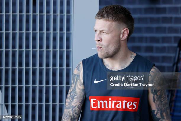 Jordan De Goey of the Magpies walks onto the ground before a Collingwood Magpies AFL training session at AIA Centre on September 25, 2023 in...