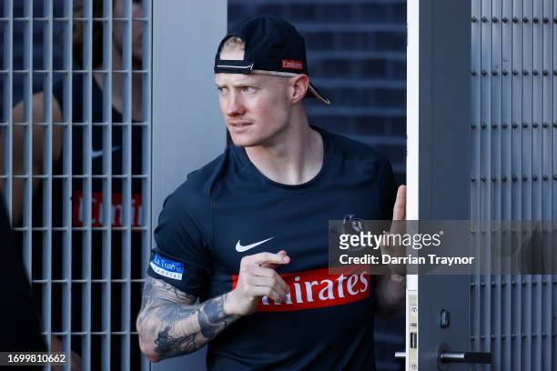 John Noble of the Magpies walks onto the ground before a Collingwood Magpies AFL training session at AIA Centre on September 25, 2023 in Melbourne,...