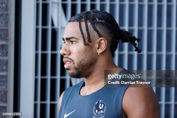 Isaac Quaynor of the Magpies walks onto the ground before a Collingwood Magpies AFL training session at AIA Centre on September 25, 2023 in...