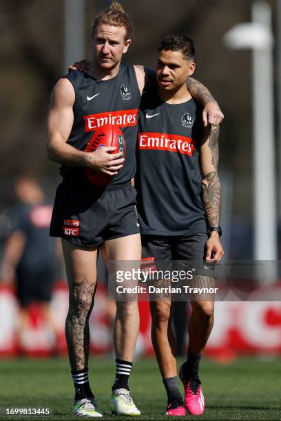 Beau McCreery and Bobby Hill of the Magpies take part during a Collingwood Magpies AFL training session at AIA Centre on September 25, 2023 in...