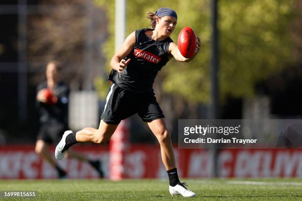 Jack Ginnivan of the Magpies gathers the ball during a Collingwood Magpies AFL training session at AIA Centre on September 25, 2023 in Melbourne,...
