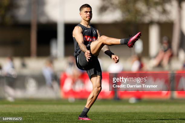 Bobby Hill of the Magpies kicks the ball during a Collingwood Magpies AFL training session at AIA Centre on September 25, 2023 in Melbourne,...