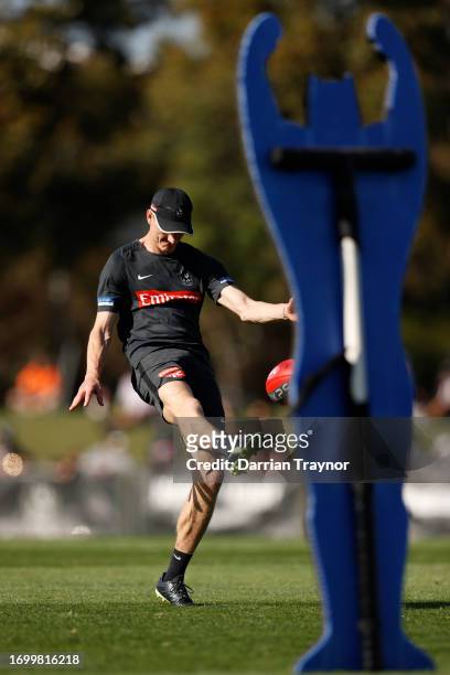 Will Hoskin-Elliott of the Magpies kicks the ball during a Collingwood Magpies AFL training session at AIA Centre on September 25, 2023 in Melbourne,...