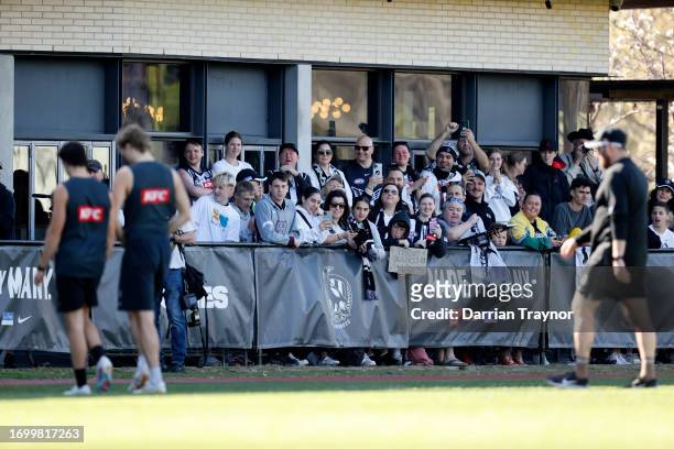 Fans look in during a Collingwood Magpies AFL training session at AIA Centre on September 25, 2023 in Melbourne, Australia.