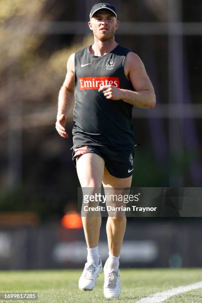 Tom Mitchell of the Magpies jogs during a Collingwood Magpies AFL training session at AIA Centre on September 25, 2023 in Melbourne, Australia.