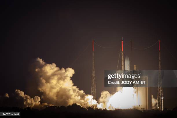 The Ariane 5 blasts off from the ground at the French Guiana European Spaceport of Kourou on June 5, 2013. A European rocket blasted off from French...