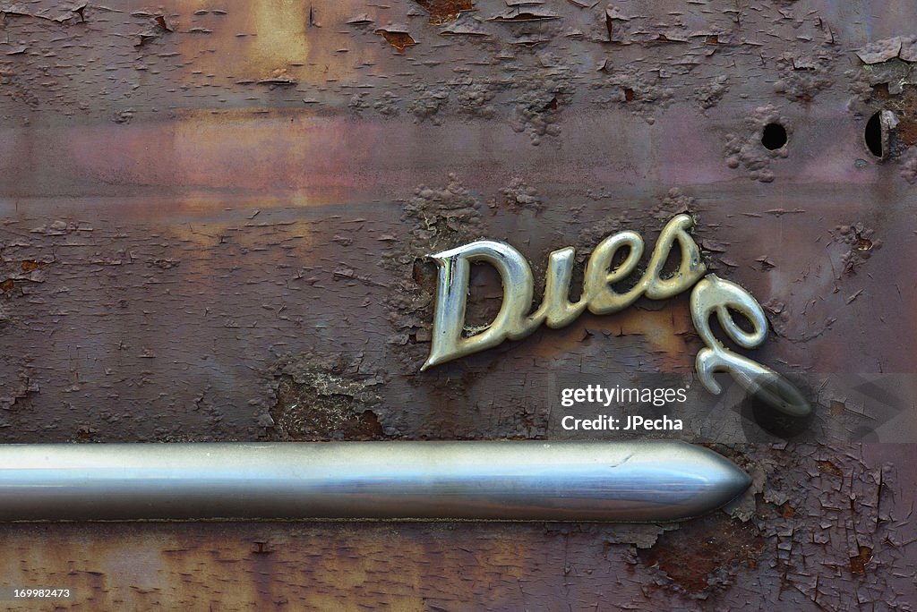 Close-up view of an old rusted vehicle