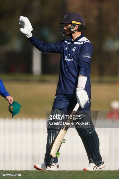 Peter Handscomb of Victoria celebrates reaching fifty runs during the Marsh One Day Cup match between Victoria and Tasmania at CitiPower Centre, on...