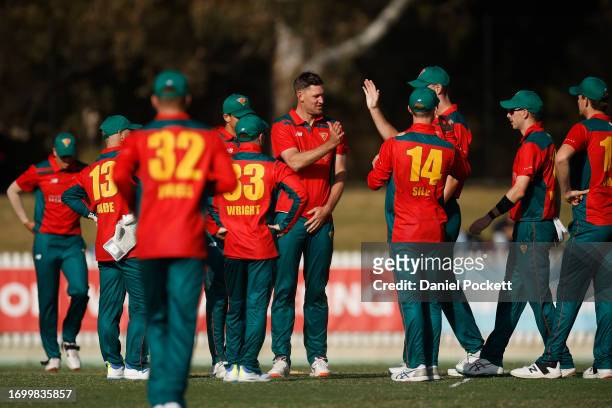 Beau Webster of Tasmania celebrates the dismissal of Peter Handscomb of Victoria during the Marsh One Day Cup match between Victoria and Tasmania at...