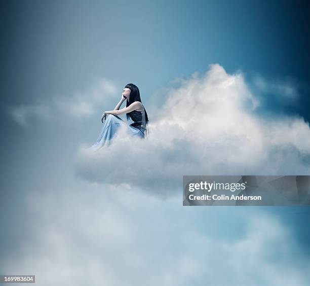 dreamer - sitting on a cloud foto e immagini stock