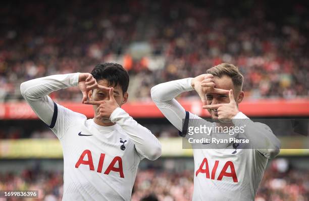Heung-Min Son of Tottenham Hotspur celebrates with James Maddison of Tottenham Hotspur after scoring his teams second goal during the Premier League...