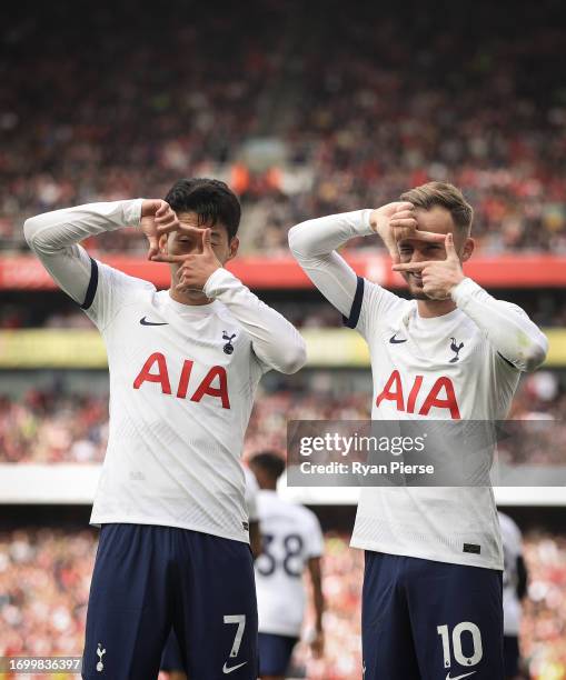 Heung-Min Son of Tottenham Hotspur celebrates with James Maddison of Tottenham Hotspur after scoring his teams second goal during the Premier League...