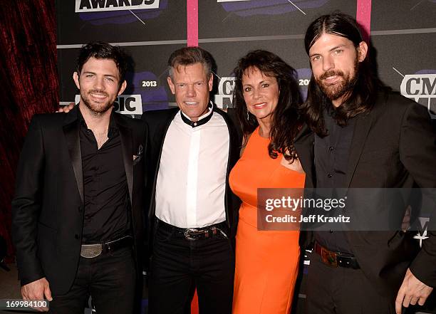 Scott Avett, Randy Travis, Mary Beougher and Seth Avett attend the 2013 CMT Music Awards at the Bridgestone Arena on June 5, 2013 in Nashville,...