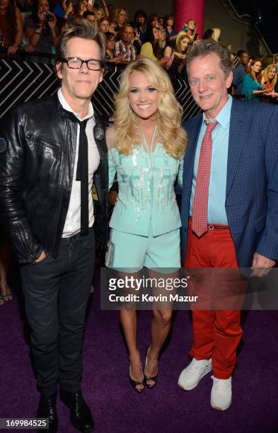 Kevin Bacon, Carrie Underwood and Michael Bacon attend the 2013 CMT Music awards at the Bridgestone Arena on June 5, 2013 in Nashville, Tennessee.