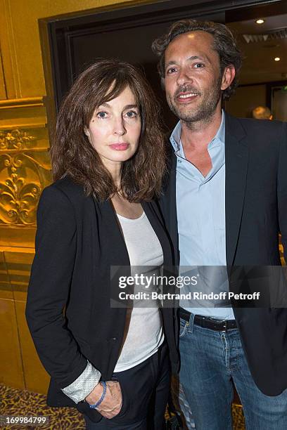 Actress Anne Parillaud and film distributor Jean-Philippe Tirel attend a cocktail party at Hotel Fouquet's Barriere following the premiere of the...