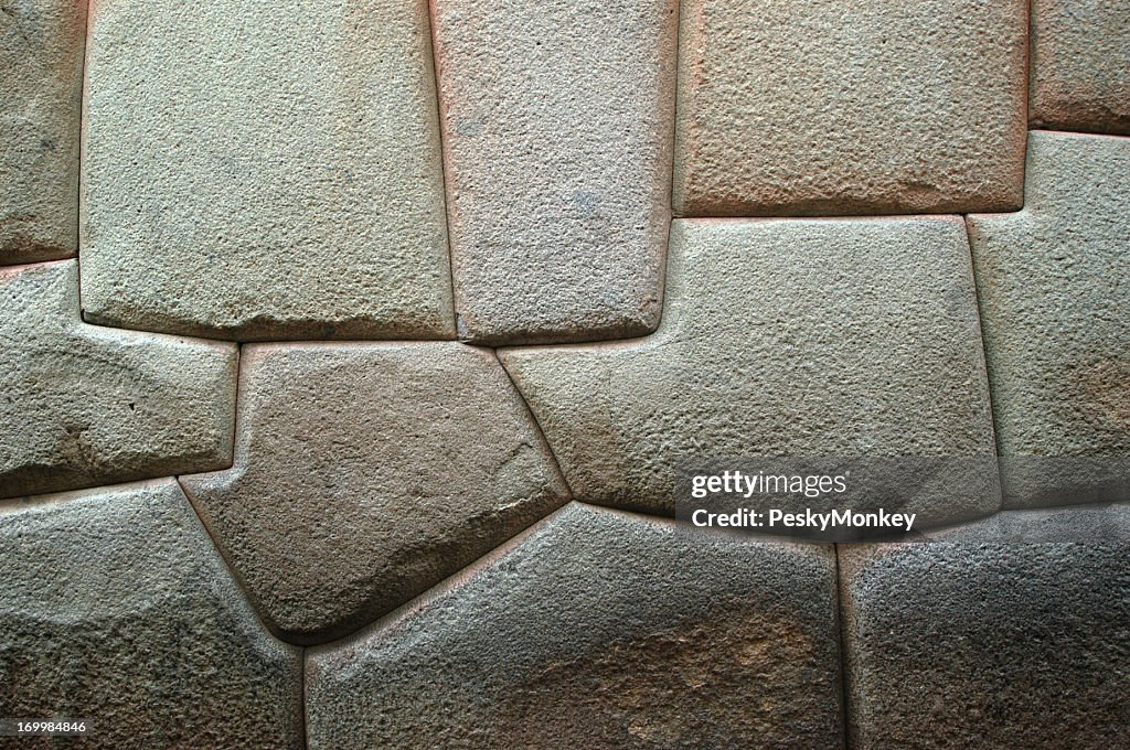 無地の彫刻を施した石の壁の背景サクサイワマンクスコペルー